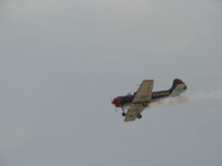 RA-3466K @ LPIN - smoke wings yak 52 doing a aerobatic show at espinho