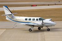 N303TL @ CID - Taxiing by my window on the way to Landmark Aviation - by Glenn E. Chatfield