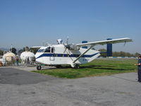 G-PIGY @ LPBR - SkyVan dropping parachutes for a film at Braga, Portugal, a very rare moviment at this aerodrome.
