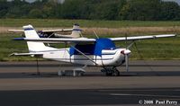 N2464U @ HWY - Looks to be a quiet day for her - by Paul Perry