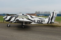 G-ZEBY @ EGNU - Piper PA-28-140 at  Full Sutton - in appropriate Zebra colour scheme