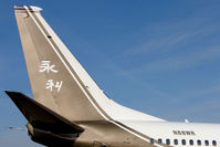 N88WR @ EGGW - Tail of Boeing 737BBJ at Luton - by Terry Fletcher