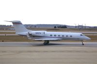 N457H @ CID - Taxiing by the tower on the way to Landmark FBO