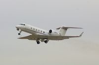 N457H @ CID - Departing Runway 9.