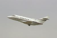 N800RC @ CID - Climbing out after taking off Runway 9 - by Glenn E. Chatfield