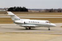 N897CW @ CID - Taxiing by my window on the way to Rockwell-Collins - by Glenn E. Chatfield