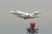 N897CW @ CID - Departing runway 9 - by Glenn E. Chatfield