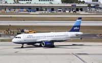 N636JB @ KFLL - Airbus A320 - by Mark Pasqualino
