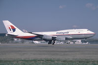 9M-MPE @ VIE - Malaysia Boeing 747-400 - by Yakfreak - VAP