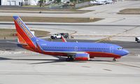 N710SW @ KFLL - Boeing 737-700 - by Mark Pasqualino