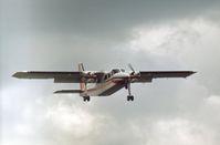 G-AXXH @ EGCD - Islander climbing out with parachute display team aboard at the 1971 Woodford Airshow. - by Peter Nicholson