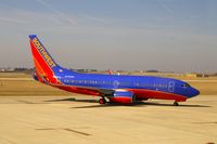 N776WN @ CID - Pulling into Landmark FBO from taxiway D, as seen from my office - by Glenn E. Chatfield