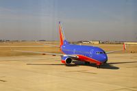 N776WN @ CID - Pulling into Landmark FBO from taxiway D, as seen from my office - by Glenn E. Chatfield