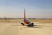 N776WN @ CID - Taxiing to Runway 13 for departure - neat shot from his six. - by Glenn E. Chatfield