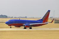 N776WN @ CID - Departing Runway 13 at high noon. - by Glenn E. Chatfield