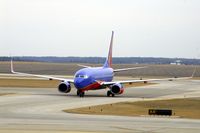 N776WN @ CID - Taxiing on Alpha 4: wingtip to wingtip - by Glenn E. Chatfield