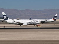 N649AS @ KLAS - Alaska Airlines / 2003 Boeing 737-790 - with N557AS landing - by Brad Campbell