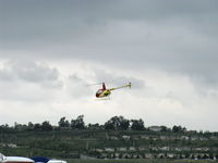 N292DD @ CMA - 2002 Robinson R22 BETA II, Lycoming O-360 derated to 131 Hp, takeoff departure - by Doug Robertson