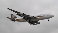 9V-SPJ @ KLAX - Landing 24R at LAX - by Todd Royer
