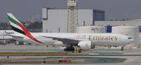 A6-EWI @ KLAX - Taxi for departure - by Todd Royer