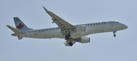 C-FNAW @ KLAX - Landing 24R at LAX - by Todd Royer
