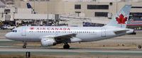 C-GAQX @ KLAX - Taxi to gate - by Todd Royer