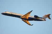 N768SK @ LAX - United Express (SkyWest Airlines) N768SK (FLT SKW6071) climbing out from RWY 25R enroute to Portland Int'l (KPDX) late in the day.