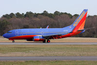 N453WN @ ORF - Southwest Airlines N453WN (FLT SWA2828) rolling out on RWY 5 after arrival from Orlando Int'l (KMCO).