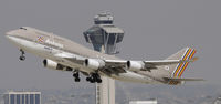 HL7418 @ KLAX - Departing LAX on 25R - by Todd Royer