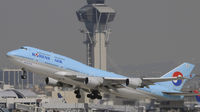 HL7491 @ KLAX - Departing LAX on 25R - by Todd Royer