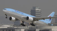 HL7598 @ KLAX - Departing LAX on 25R - by Todd Royer