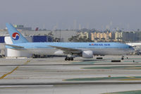 HL7734 @ KLAX - Departing LAX on 25R - by Todd Royer