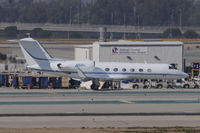N56L @ KLAX - Taxi for departure - by Todd Royer