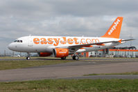 G-EZFG @ EGGW - Pictured just 4 days after delivery new Easyjet A319 taxies in at Luton - by Terry Fletcher