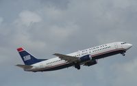 N423US @ KFLL - Boeing 737-400 - by Mark Pasqualino