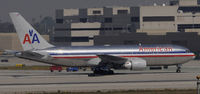 N322AA @ KLAX - Taxi to gate - by Todd Royer