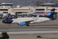 N369MX @ KLAX - Taxi to gate - by Todd Royer