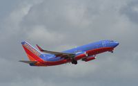N254WN @ KFLL - Boeing 737-700 - by Mark Pasqualino