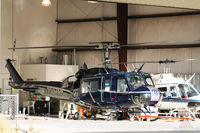 N502SH @ KGEU - UH-1H