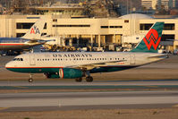 N838AW @ LAX - US Airways America West  N838AW (FLT AWE37) exitting RWY 25L after arrival from Phoenix/Sky Harbor Int'l (KPHX). - by Dean Heald