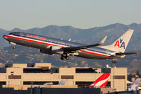 N915AN @ LAX - American Airlines N915AN (FLT AAL2430) climbing out from RWY 25R enroute to Dallas/Fort Worth Int'l (KDFW). - by Dean Heald