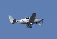 N949CG @ KSNA - Cirrus SR22 on short final - by Mike Khansa