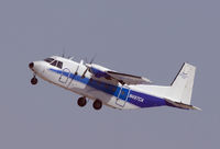 N497CA @ KNJK - CASA CN212 Showing off at the '09 El Centro Airshow - by Mike Khansa