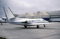 OY-ASR @ EGLL - Parked in BA Maintenace area - by keith sowter