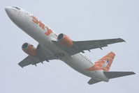 TC-SKE @ EBBR - Climbing through the morning gloom from rwy 25R. - by Philippe Bleus