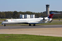 N153PQ @ ORF - Delta Connection (Pinnacle Airlines) N153PQ (FLT FLG5860) taxiing to RWY 23 for departure to Hartsfield-Jackson Atlanta Int'l (KATL).