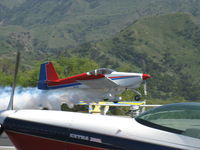 N64SH @ SZP - 2004 Hoang VAN's RV-6A, Lycoming O-360-A1A 180 Hp, razzle-dazzle takeoff with airshow smoke for the photographer. Thanks! - by Doug Robertson