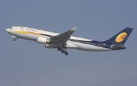 VT-JWQ @ EBBR - Rising from rwy 25R. Gear on the move. Notice the two domes on the back (GPS and more). - by Philippe Bleus