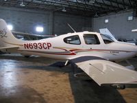N693CP @ KMIC - Crowded hangar! Not enough room for a full pic. Oh well, nice plane though, huh? - by Kreg Anderson