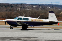 N3860H @ FIT - A Nice Mooney Taxis Out - by Bruce Vinal